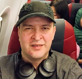 Николай